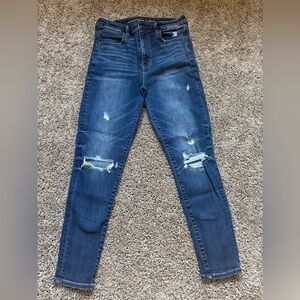 American Eagle Outfitters Dark Blue Ripped Skinny Jeans. Size 8 short